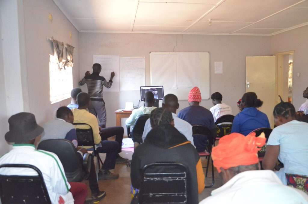 Young people during the entrepreneurial training in pig production