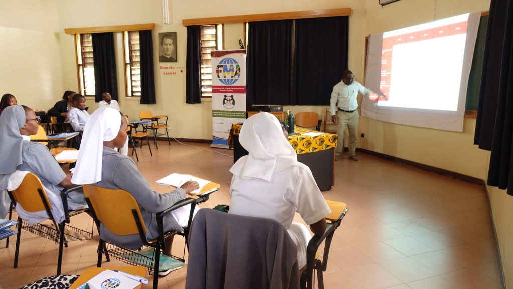 Fr. Ismael Matambura SJ., AJAN Director, take the participants through the session on HIV and AIDS