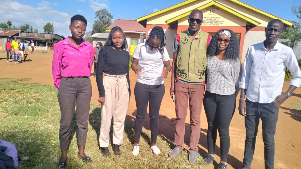 The 6 AHAPPY trainers from the Catholic Diocese of Eldoret pose for a photo at the end of the sensitization activity