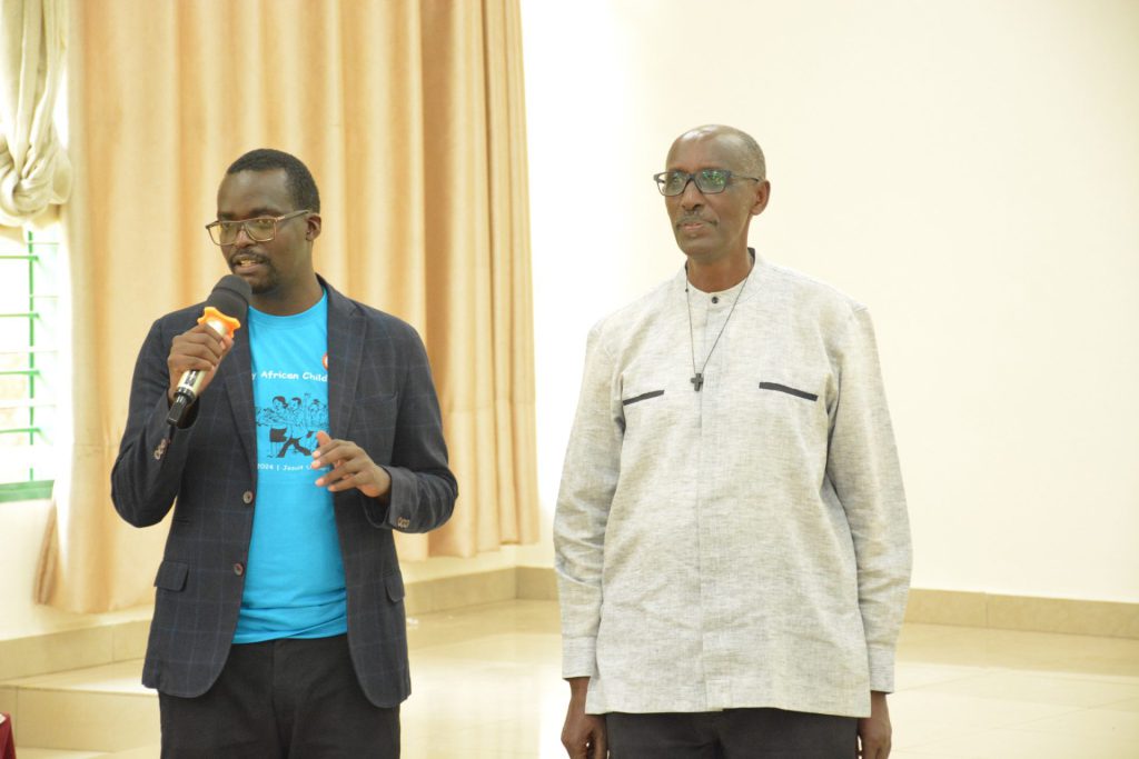 Fr Ernest Ngiyembere, SJ. and Fr Tite Mutemangando, SJ. during the African Child Day Celebration at JUC.