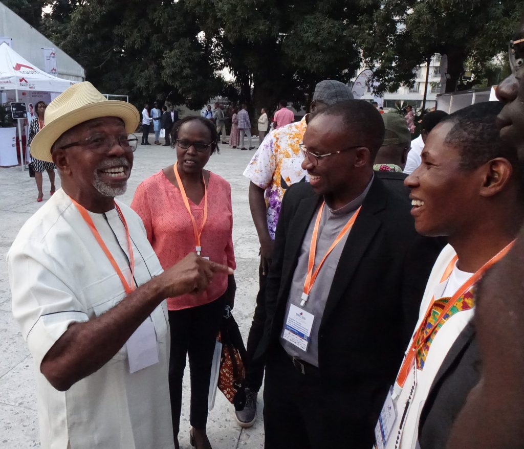 Fr. Godfrey Nzamujo, founder of the Songhaï Centre interacts with the AJAN delegates at the DRC Social Innovation Summit this September.